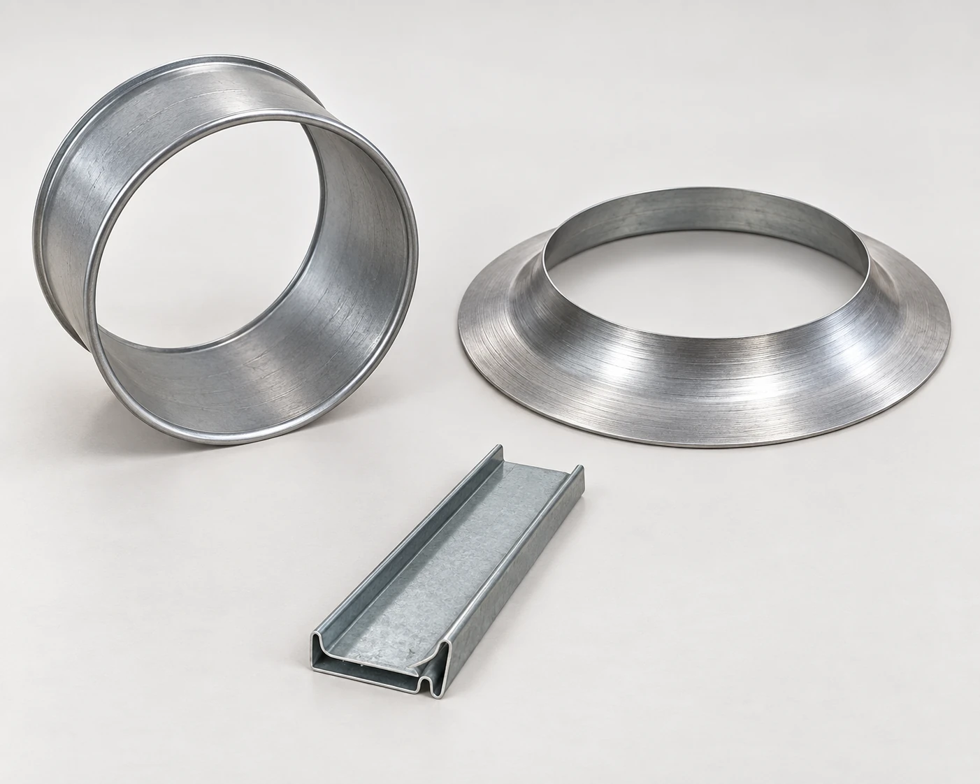 AI illustration comparing a fan casing, spun annular part and TDC connector profile.